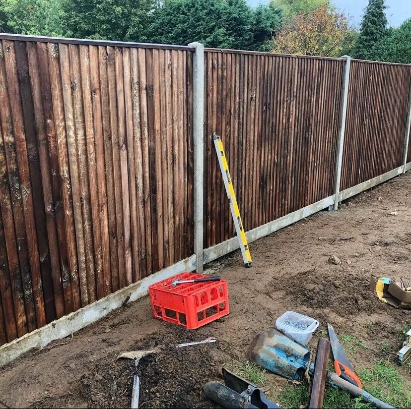 Replacement fence panels fitted after storm damage